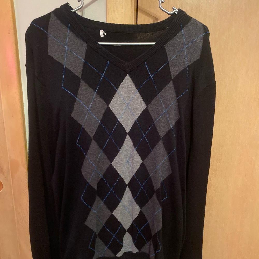Ripped tag black and blue sweater